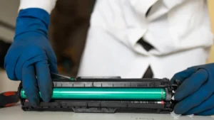 Men-Holding-Printer-Toner